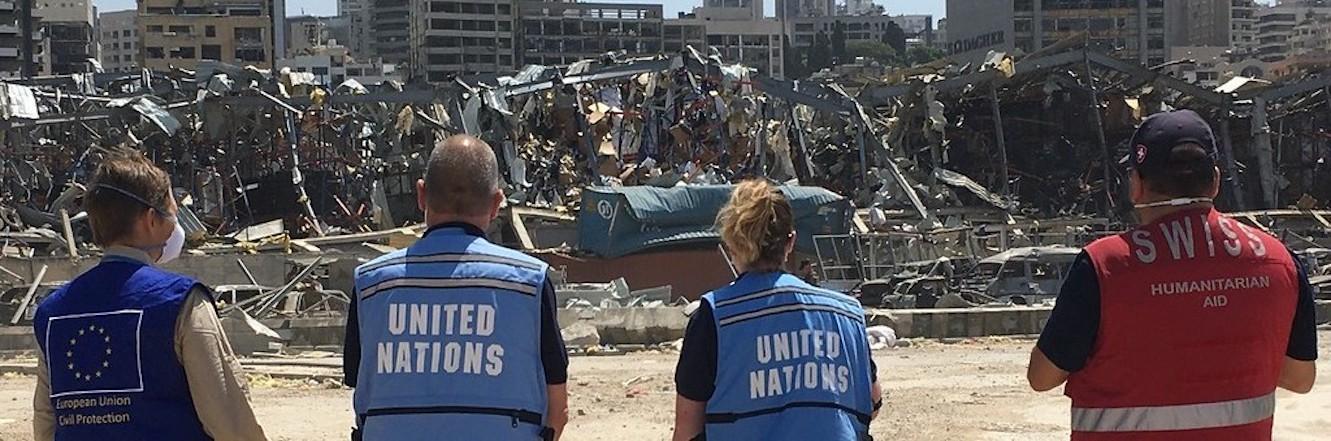 UNDAC Team reviewing serious building damage